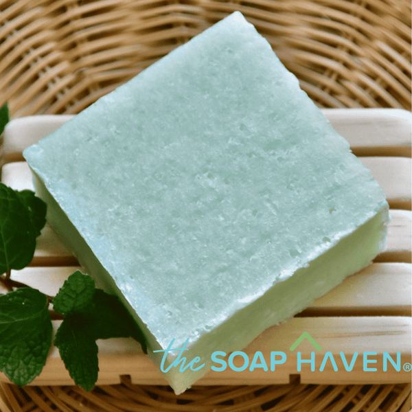 The Soap Haven Singapore Argan Oil Tea Tree Mint Shampoo Bar (Small, 55g travel size) for all hair types and scalp care with The Soap Haven logo.