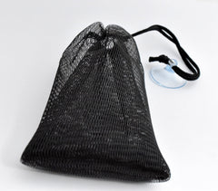 The Soap Haven black soap saver mesh bag with a black drawstring cord and a clear plastic suction cup for soap bar.